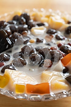 top view bowl of grass jelly vertical composition