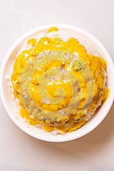 top view bowl of rice with curry on top vertical composition