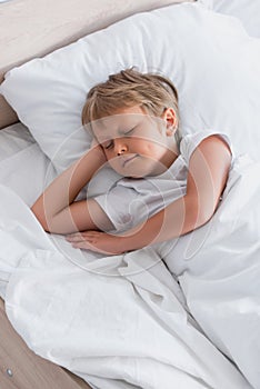 Top view of boy on white