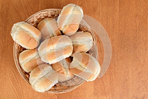Top view bread rolls in wicker basket