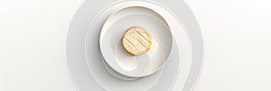 Top View Brie De Meaux On White Round Plate On White Background