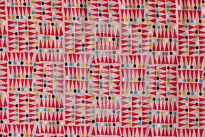 Bright colourful cotton fabric with geometric shapes and figures