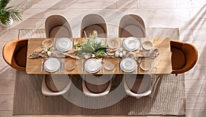Top view on bright dining room interior with dinner table