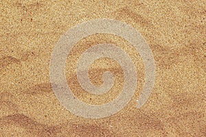 Top view of brown beach sand texture, summer holiday background