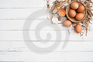 Top view brown chicken egg  in bamboo basket