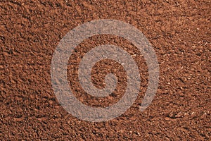 Top view of brown fertile agricultural soil, aerial shot