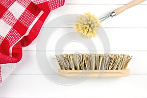 Top-view of brushes and tea towel