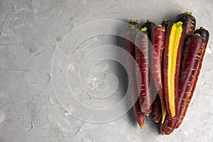 Top view of bunch of fresh organic red carrots. Healthy food