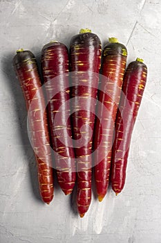 Top view of bunch of fresh organic red carrots. Healthy food