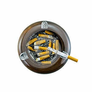 Top view of burning cigarette in ashtray