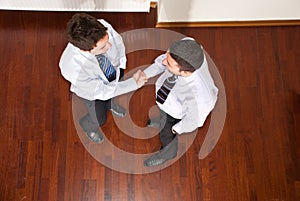 Top view of business men hand shake
