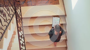 Top view of business people climbing stairs