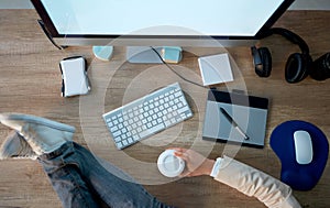 top view of business working desk â€“ designer woman take a coffee break .