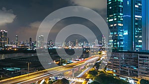 Top view of busy traffic night in finance urban timelapse, hong kong city