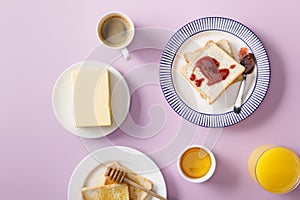 Top view of butter, coffee, orange