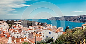 Top view in Cadaques, Catalonia, Spain near of Barcelona. Scenic old town with nice beach and clear blue water in bay. Famous