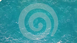 Top view of calm water surface. Aerial view of the sea waters.