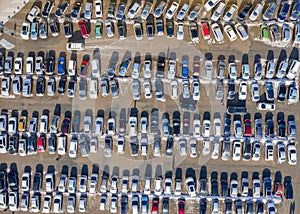 Top view of the car park during the snowmelt in spring