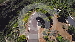 Top view of a car rides along a mountain road on Tenerife, Canary Islands, Spain. Way to the Teide volcano, Teide