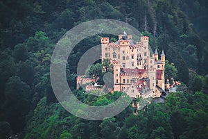 Top view Castle Hohenschwangau in Germany. The Royal Palace in Bavaria. The yellow famous palace is a tourist attraction.