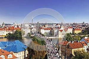 Top view of center of Prague with its red roofs and tower of the Charles bridge, Prague,