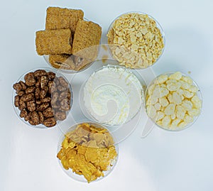 Top view of Cereals types in a cup. Breakfast Concept