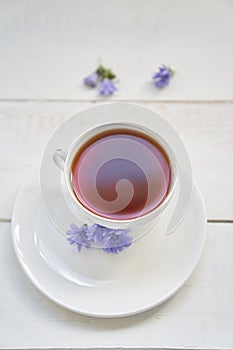 Top view of the chicory drink. Cichorium intybus, the flowers of which are usually called blue sailors, chicory, coffee