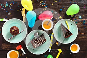 Top view children birthday table festive food chocolate cake dec