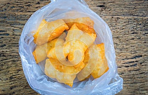 Top view Chinese deep fried dough sticks in plastic bag