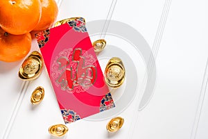 Top view Chinese New year red envelope packet ang pow with g