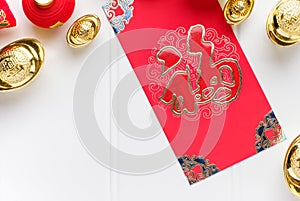 Top view Chinese New year red envelope packet ang pow with gol photo