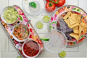 Top view chips, salsa and margaritas