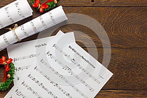 Top view Christmas music note paper with Christmas decoration o