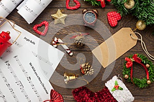 Top view Christmas music note paper with Christmas decoration o