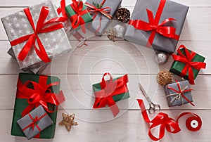 Top view of christmas present boxes on white wood background