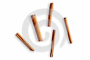 Top view of cinnamon stick isolated on white