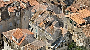 Top view of the city from the bell tower, roofs of houses in old town, beautiful cityscape, sunny day, Split, Croatia