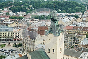 Top view from city hall tower on old high catholic cathedral tower in Lviv city, Ukraine