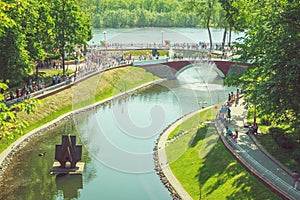 Top view of the city park with a pond