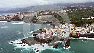 top view of the city of Puerto de la Cruz on the island of Tenerife. Volcanic beaches in the Atlantic Ocean