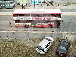 Top view on city tour bus Stadtrundfahrt