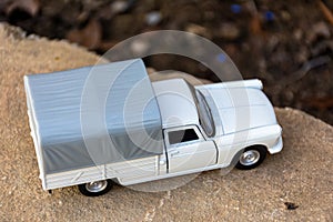 Top view of classic miniature Peugeot 404 pick-up.