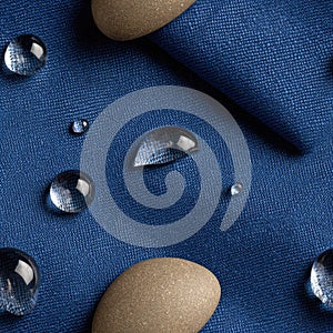 Top view of clear water droplets on a blue background featuring an abstract texture and ample copy space for design uses SEAMLESS