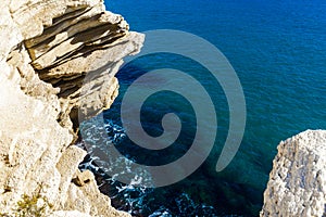 Top view of cliffs, bays, clear sea - nature background