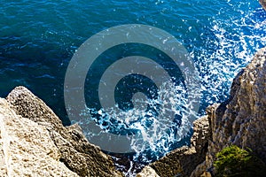 Top view of cliffs, bays, clear sea - nature background