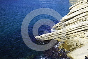 Top view of cliffs, bays, clear sea - nature background