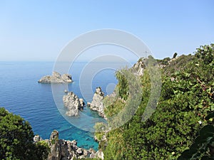 Top view of cliffs, bays, clear sea