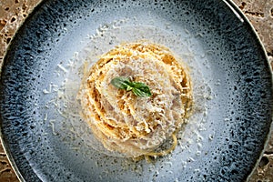 Close up Italian pasta with cheese and black pepper photo