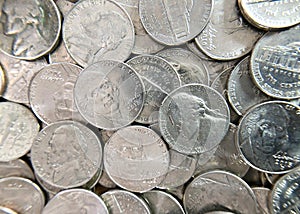 Top view close up of pile of US currency nickels