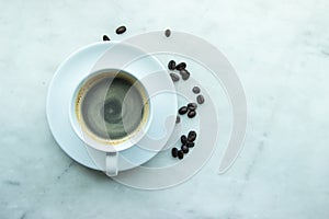 Top View, Closed up hot coffee mug on white plate and cup with h